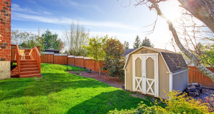 Fenced backyard with storage shed in Jacksonville